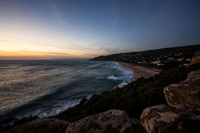 Scenic view of sea against sky during sunset