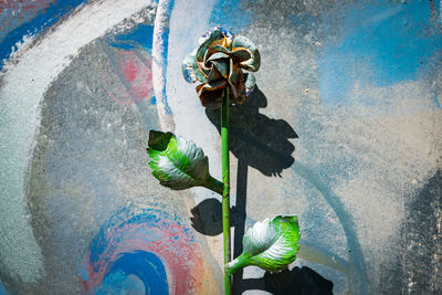 Close-up of metallic sculpture against wall