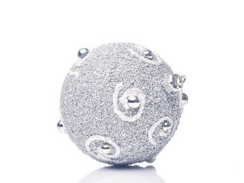 Close-up of electric lamp against white background