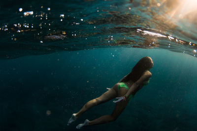 Man swimming in sea