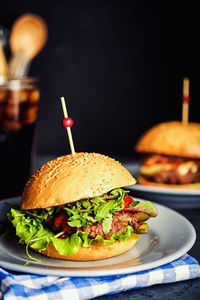 Close-up of burger in plate on table