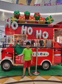Full length portrait of a boy standing outdoors