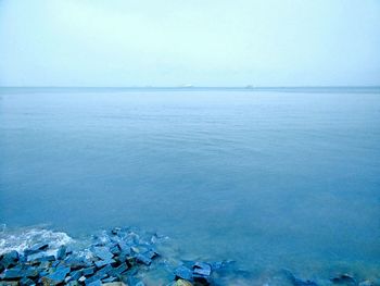 Scenic view of sea against clear sky