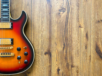 High angle view of guitar on table