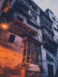 Low angle view of old building against sky