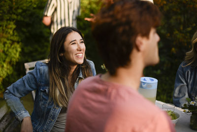 Portrait of smiling friends looking away