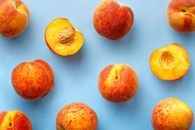Close-up of oranges against white background