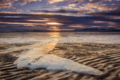 Scenic view of dramatic sky during sunset