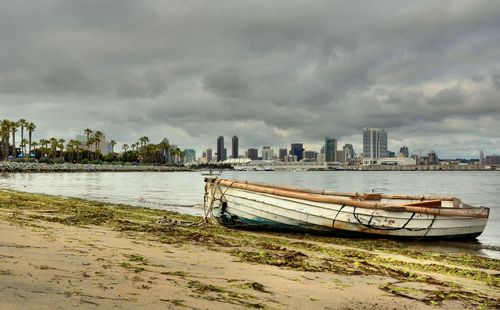 Boats moored at harbor