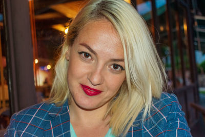 Close-up portrait of smiling woman