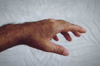 Close-up of human hand with paint