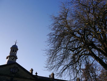 Low angle view of statue against clear blue sky