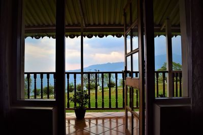 View of sea seen through window