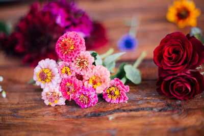 Close-up of flower on wooden table