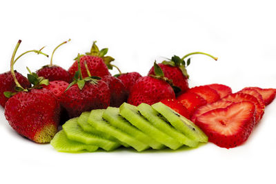 Close-up of strawberries against white background