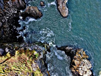 High angle view of rock formation in sea