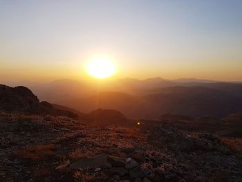 Scenic view of mountains against sky during sunset