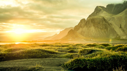 Scenic view of landscape against sky during sunset