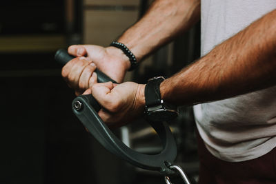 Close-up of man hands excersize in gym