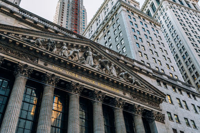 Low angle view of new york stock exchange in city