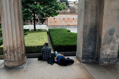 Men sitting in park