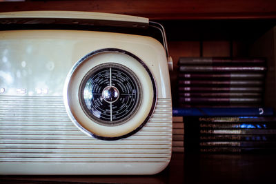 Close-up of vintage radio on table