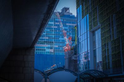 Low angle view of modern buildings in city