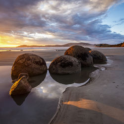 Rocks against sky during sunset