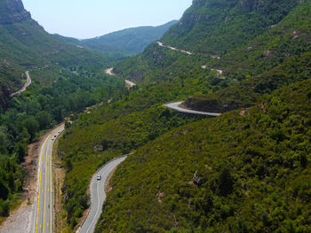 High angle view of road amidst mountains