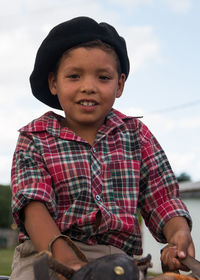 Little boy wearing traditional clothing