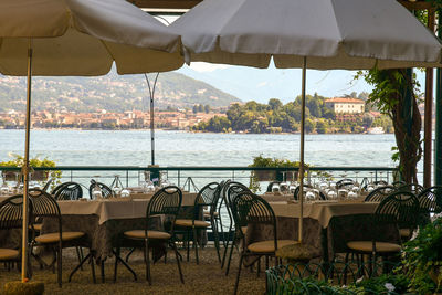 Outdoor restaurant with a view of the maggiore lake, piedmont, italy