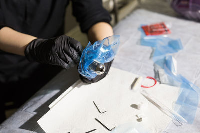 High angle view of person working on table