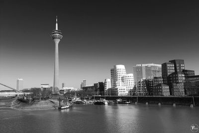 Modern buildings in city at waterfront