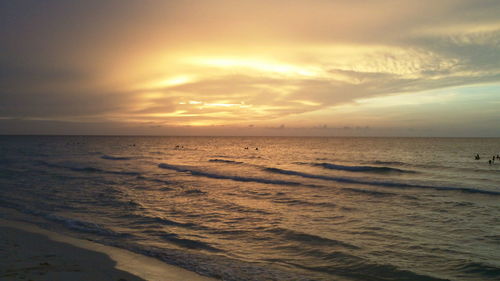 Scenic view of sea against sky during sunset