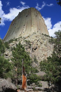 Low angle view of rock formation on mountain against sky