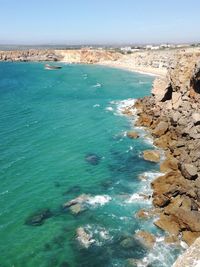 High angle view of sea shore against sky