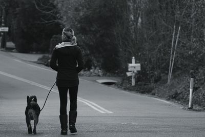 Man walking on road