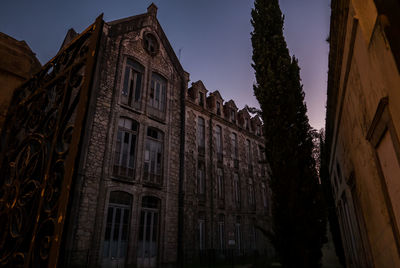 Low angle view of old building against sky