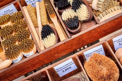 High angle view of brushes for sale in store