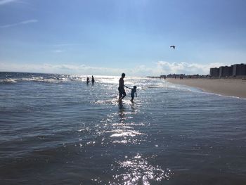 View of people on sea shore