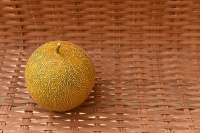 Close-up of yellow fruits in basket