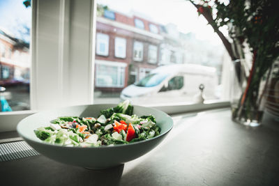 Vegetables in bowl on table