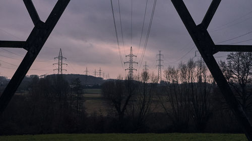 View of electricity pylon in field