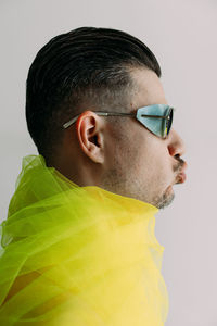 Side view of man wearing sunglasses
