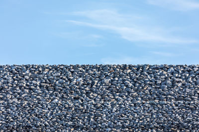 Stack of stones against sky