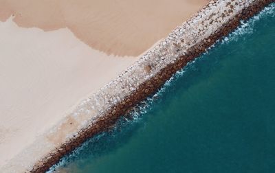 High angle view of surf on beach