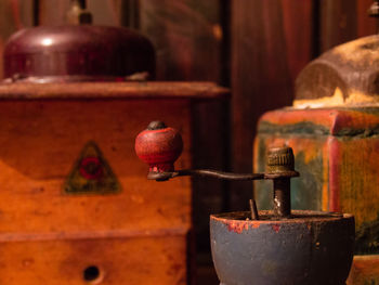 Close-up of coffee grinder on table