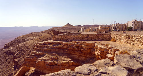 High angle view of camel mount at ramon crater against clear sky