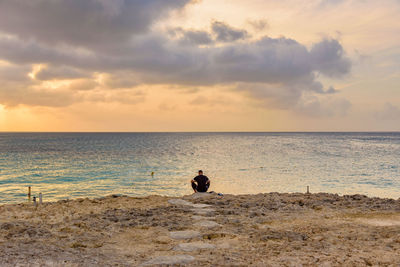 Scenic view of sea against sky during sunset