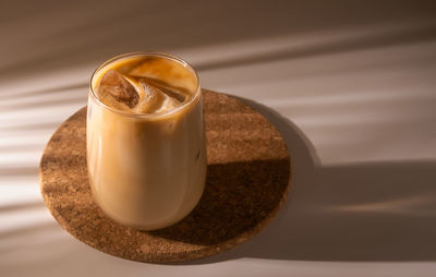 Close-up of coffee cup on table